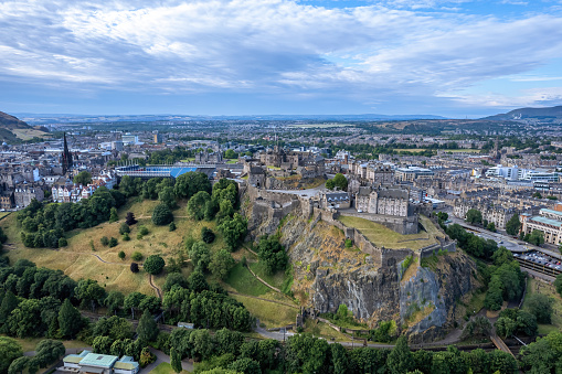 Edinburgh, Scotland- July 11, 2022: Aerial view of Edinburgh Castle. Edinburgh Castle is a castle built on the volcanic Castle Rock in the centre of Edinburgh, and is easy to see from the main shopping street.