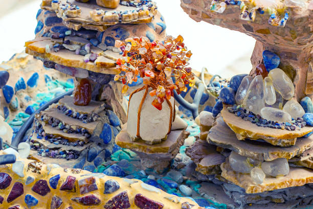 istock Bright colorful gem tree with lapis lazuli and other gemstones and crystals in decorative composition for meditation and other spiritual practices 1410985324
