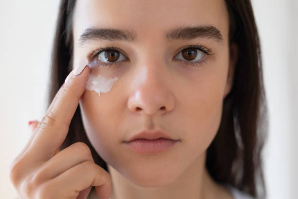 istock She is applying lotion on the face 1410987696