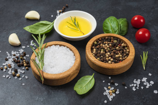 istock Food background from vegetable, spices, herb on black table. 1410990129