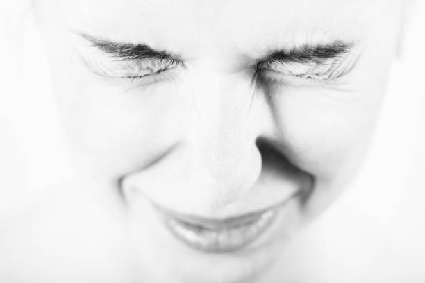 istock woman with narrowed eyes 1410991307