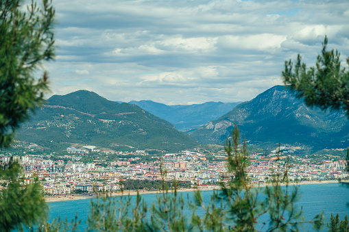 Arial view to beautiful Alanya, marina, Mediterranean sea and mountains, Turkey