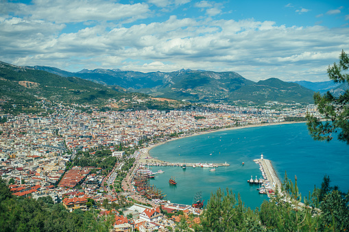 Arial view to beautiful Alanya, marina, Mediterranean sea and mountains, Turkey