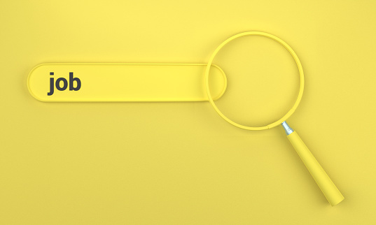 Searching for Job in search bar with magnifying glass. SEO concept on yellow background.