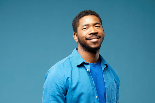 istock Smiling Multiethnic Man on Blue AI Face 1410998473