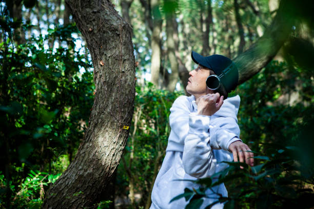 istock Man stretching in the forest 1410999389