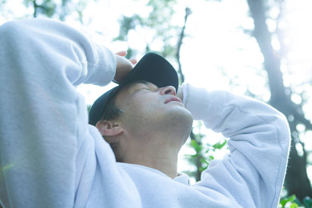 istock Taking a deep breath with trees in the background 1410999403
