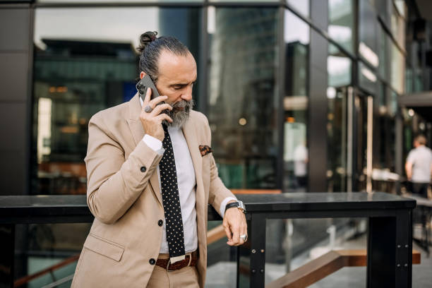 istock Classy senior in a city 1410999587