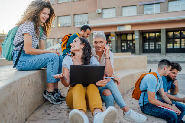 istock Female students read notes on the laptop 1411001962