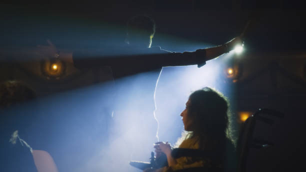 istock Director talking to actor and disabled actress 1411002428