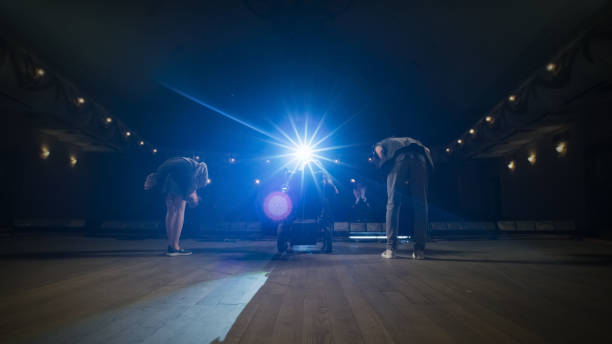 the cast with disabled actress bowing on stage - bowing imagens e fotografias de stock