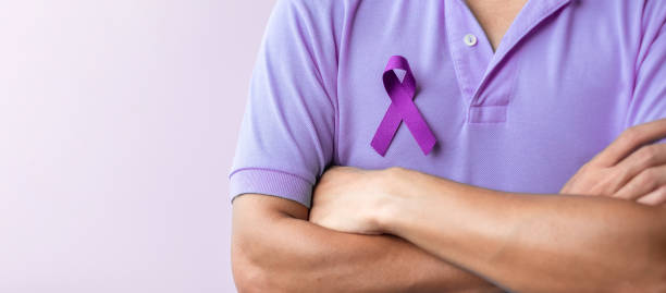 purple Ribbon for Violence, Pancreatic, Esophageal, Testicular cancer, Alzheimer, epilepsy, lupus, Sarcoidosis and Fibromyalgia. Awareness month and World cancer day concept purple Ribbon for Violence, Pancreatic, Esophageal, Testicular cancer, Alzheimer, epilepsy, lupus, Sarcoidosis and Fibromyalgia. Awareness month and World cancer day concept pyloric sphincter stock pictures, royalty-free photos & images