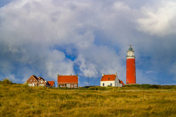 istock Texel lighthouse in the dunes with during a stormy autumn night 1411003599