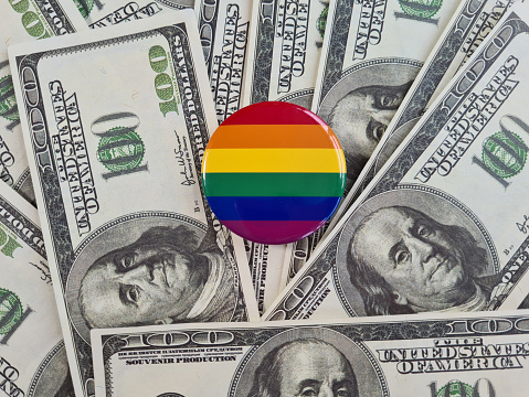 LGBT pride flag with gay community money. Criminal danger of gay and lesbian homosexual love