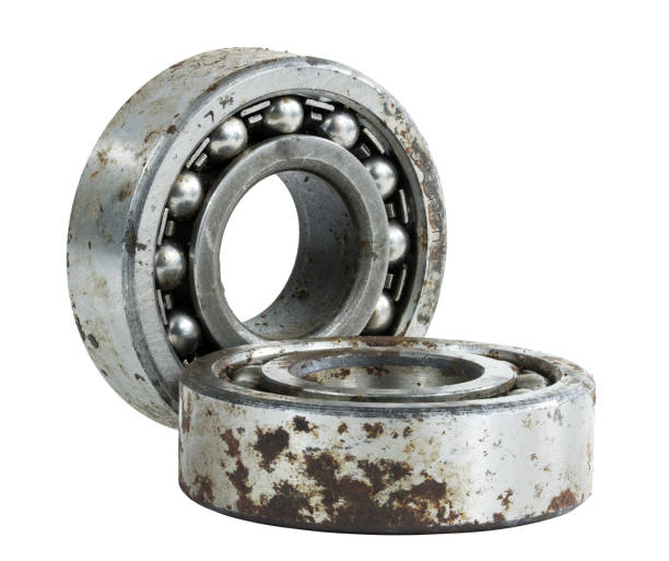 istock Bearing on a white background. Old worn bearing covered with rust 1411004324