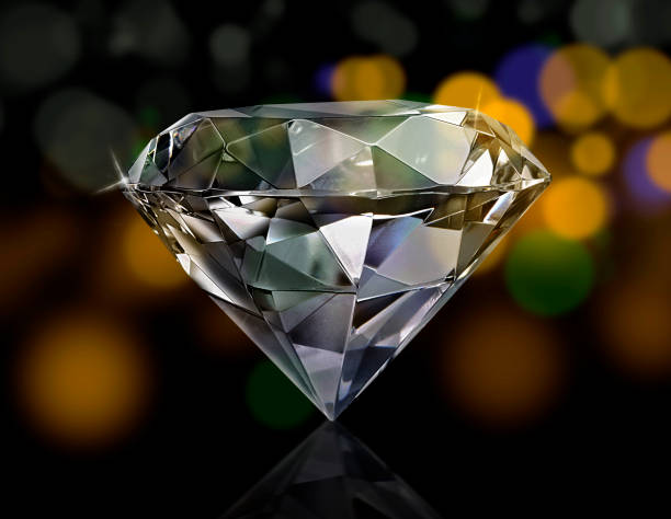 istock Dazzling diamond on shining bokeh background. concept for chossing best diamond gem design 1411007365