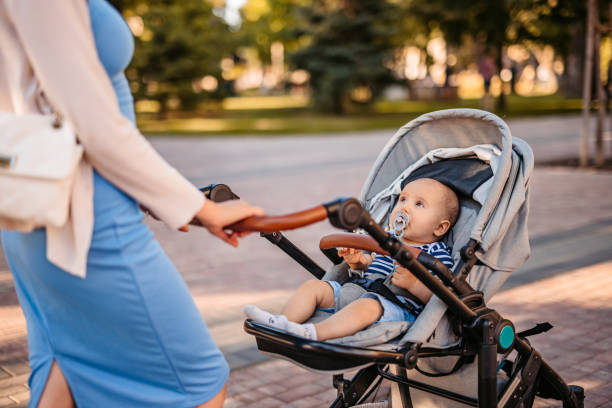 The family gathered to take a stroll through the city's squares and shopping centers while pushing the baby in his stroller.