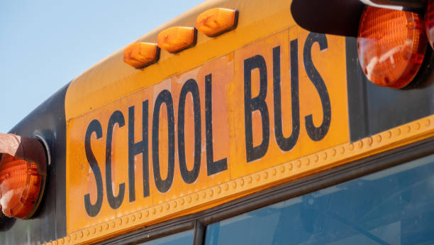 istock School Bus Inscription on old American school bus 1411008727