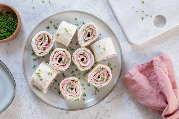 istock Ham and cream cheese rolled up in a tortilla 1411011127