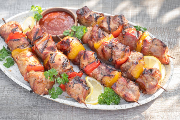 istock Grilled pork kebab with red and yellow pepper 1411011158