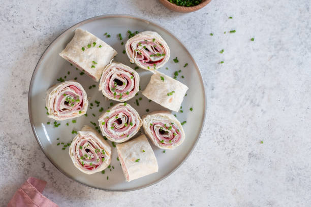 istock Ham and cream cheese rolled up in a tortilla 1411011398