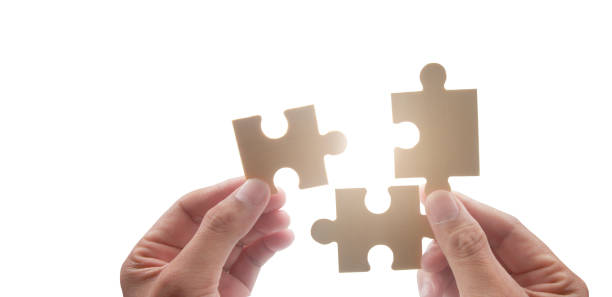 istock Connecting jigsaw puzzle. Business solutions success 1411012084