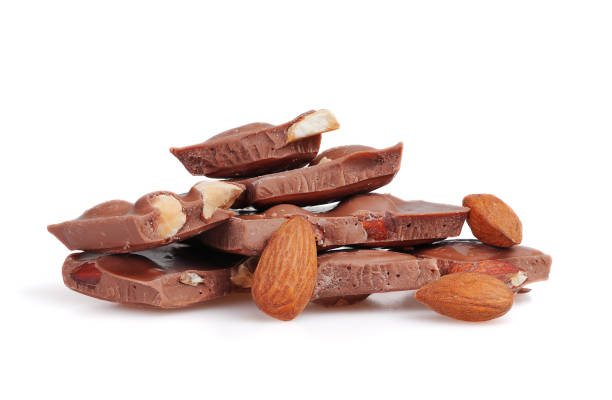 istock Broken chocolate bar with almonds isolated on white background 1411012234