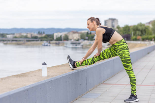 istock Athlete stretching after a run outdoors 1411015295
