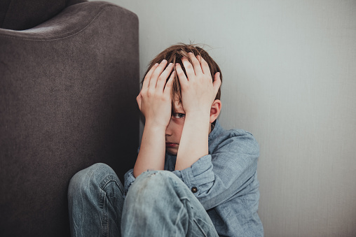 Scared child boy depressed emotion panic attacks alone sick people fear stressful crying. Stop abusing domestic violence,help person with health anxiety,thinking bad frustrated exhausted