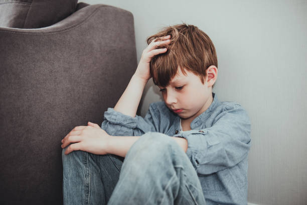 istock Upset child boy emotion panic attacks alone sick people fear stressful crying. Stop abusing domestic violence,help person with health anxiety,thinking bad frustrated exhausted 1411015776