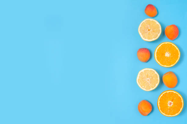 istock Bright fruits on a blue background 1411016023