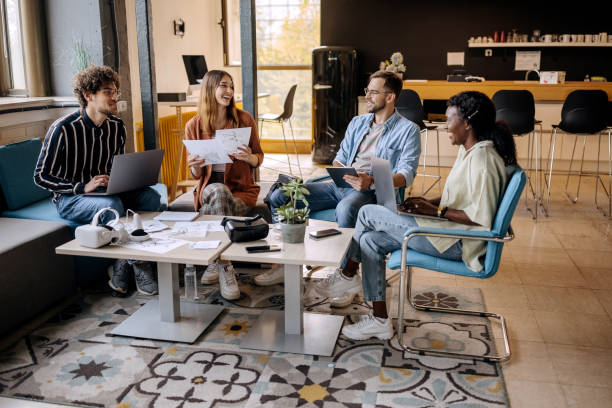 istock Colleagues working together in the office 1411018754