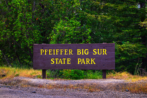 Welcome sign at the entrance to Pfeiffer Big Sur State Park along the Cabrillo Highway CA-1 in Big Sur, California