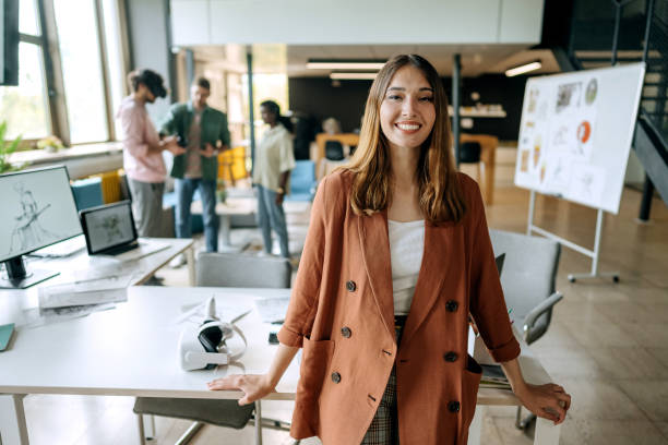 istock Young female game software designer posing in the office 1411020257
