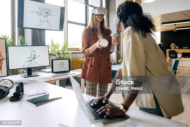 Vr Game Developers At Work Stock Photo - Download Image Now - City Life, Cooperation, Creativity