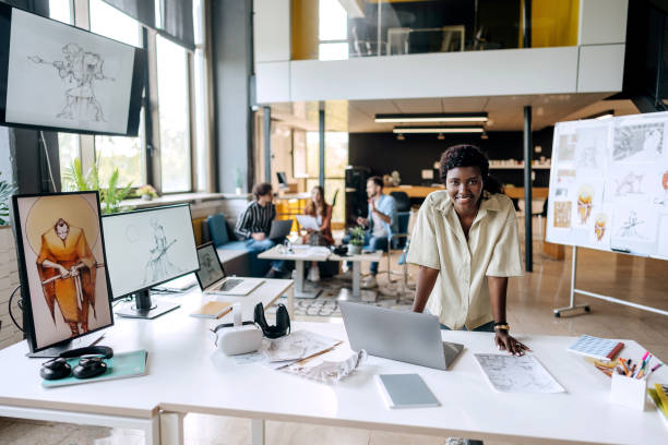 istock Young female game designer posing in the office setup 1411020610