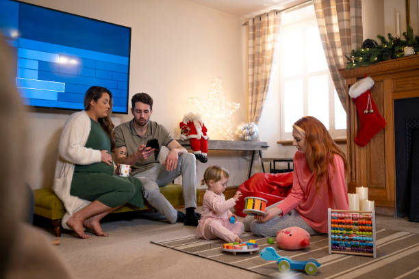 istock Visiting Friends at Christmas 1411020940