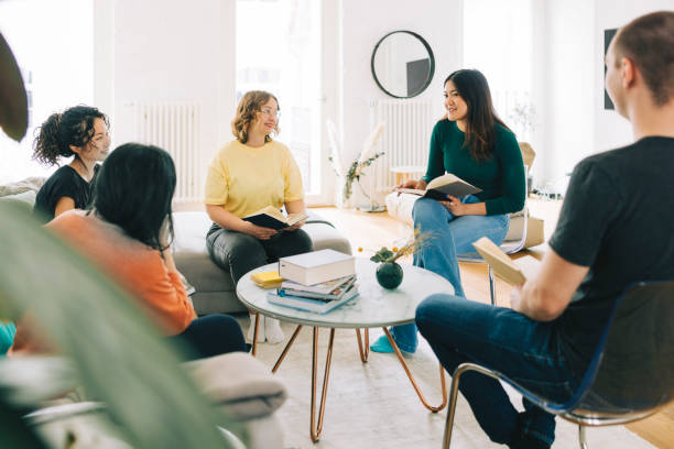 istock Book club group discussing a lecture 1411021566