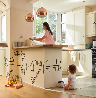 toddler gets to grips with a maths equation