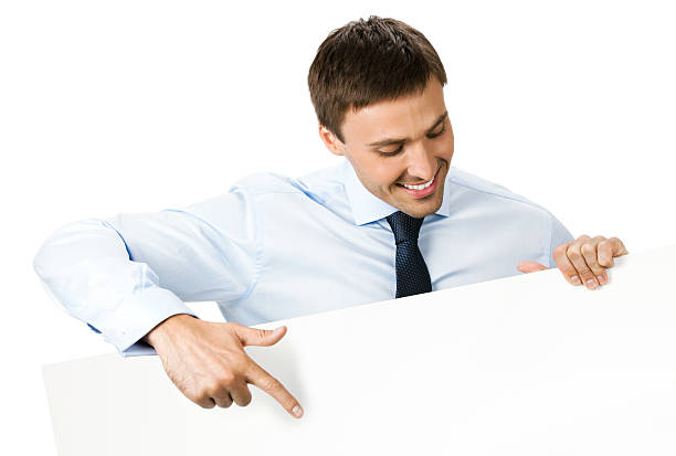 istock Businessman showing signboard, on white 141102689