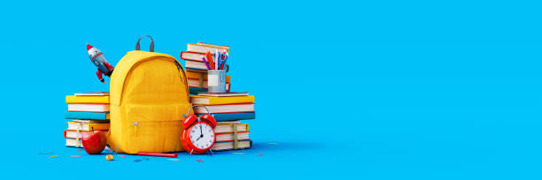 powrót do szkoły. żółty plecak z książkami i rzeczami szkolnymi na niebieskim tle - school alarm zdjęcia i obrazy z banku zdjęć