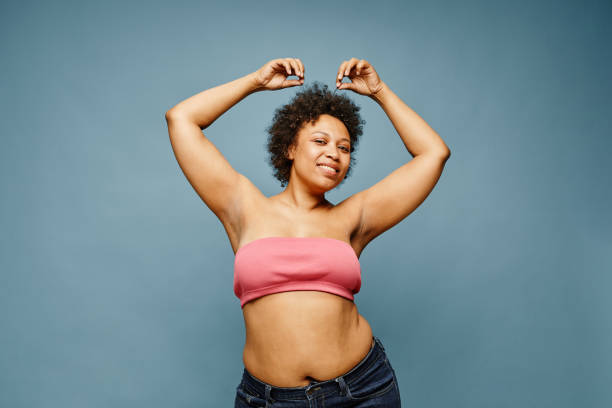 istock Carefree Black Woman Dancing 1411029873