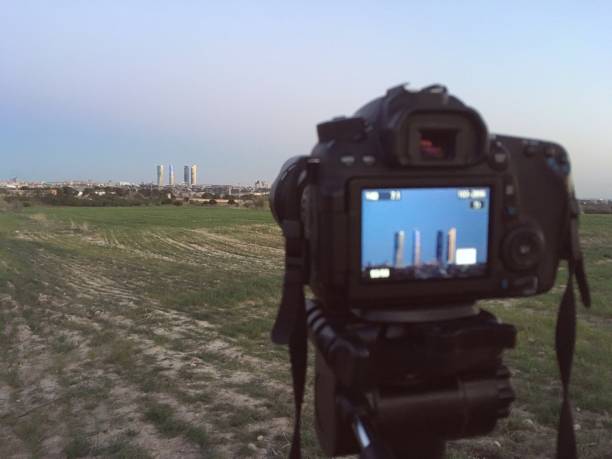 istock Taking photography with reflex camera at sunset. 1411030523