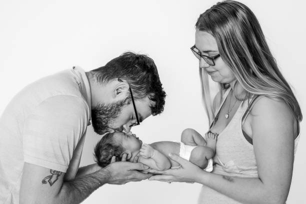 istock Newborn portraits with new  parents 1411030863