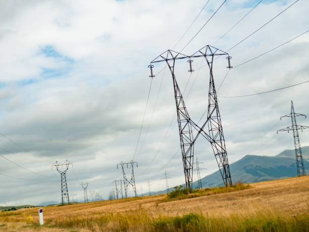 istock High Voltage power lines in a rural landscape 1411033323