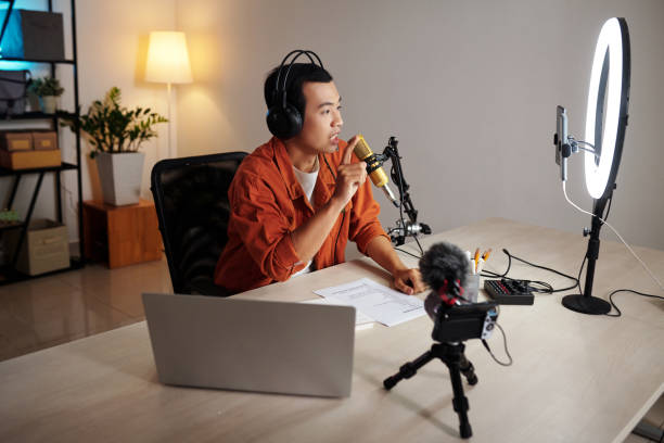 istock Blogger Recording Podcast on Emotional Topic 1411034499