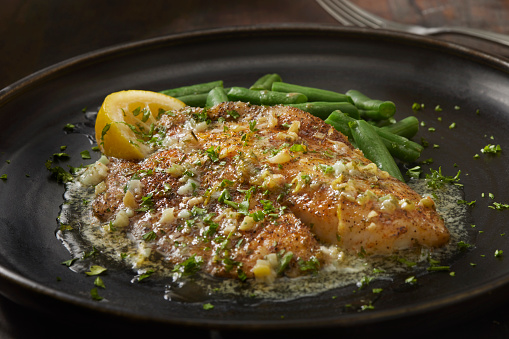 Baked Tilapia in a Lemon, Garlic and Butter Sauce with Steamed Green Beans