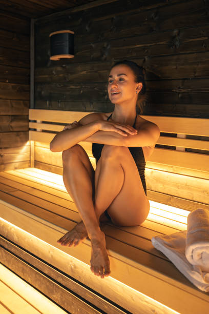 istock A young woman having rest in sauna alone. 1411034670