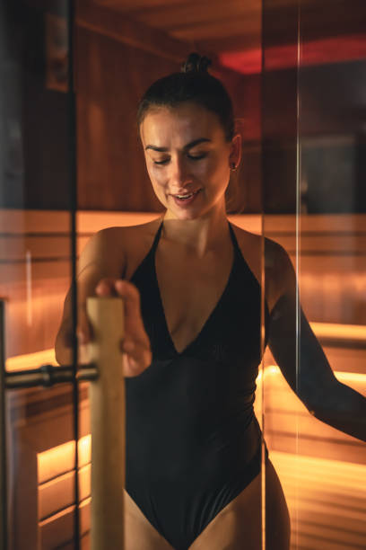 istock A young woman having rest in sauna alone. 1411034676