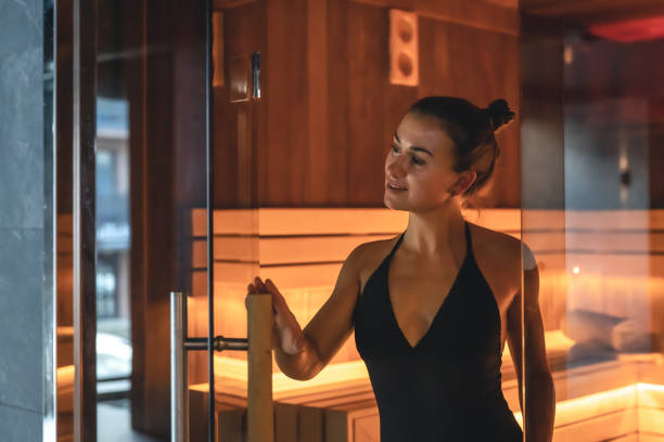 istock A young woman having rest in sauna alone. 1411034680